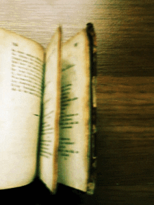 Old book leafing through pages 