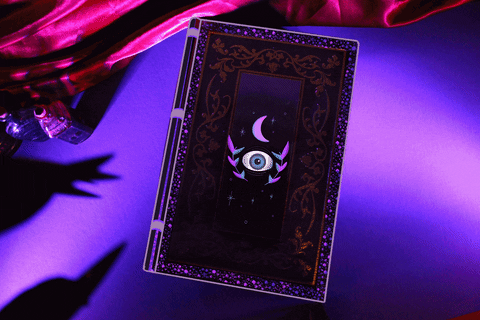 dark spell book with eye on the cover it's VERY cool