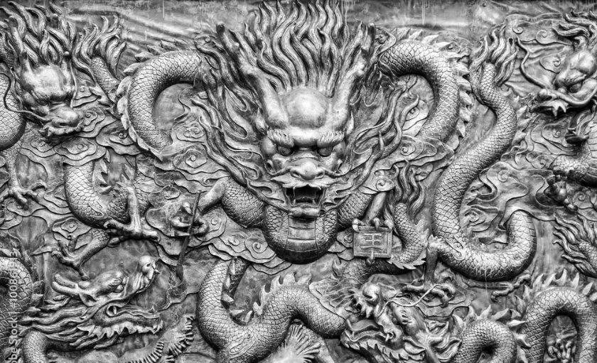 Ancient Bronze Dragons Carving in the Ancient Dragon King Temple along Yangtze River,China.