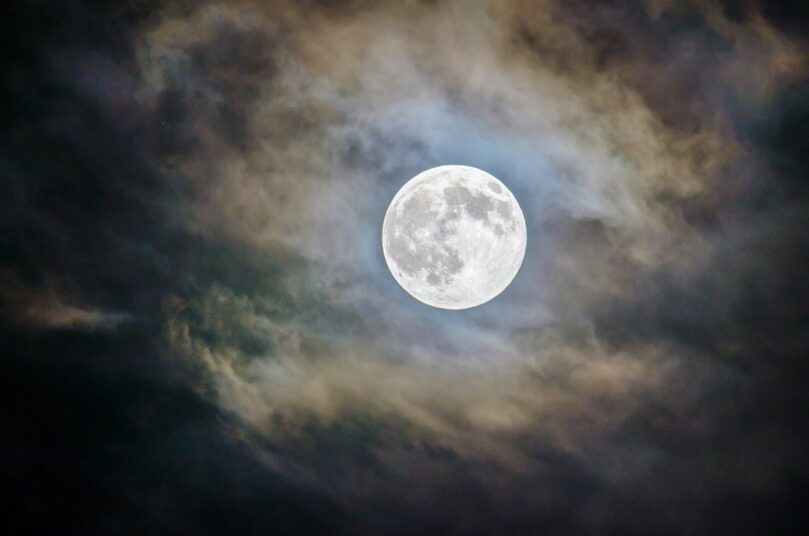 full moon shining in sky 86A