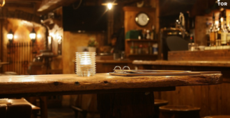an empty bar full of warm tone light and wooden edifice 49A